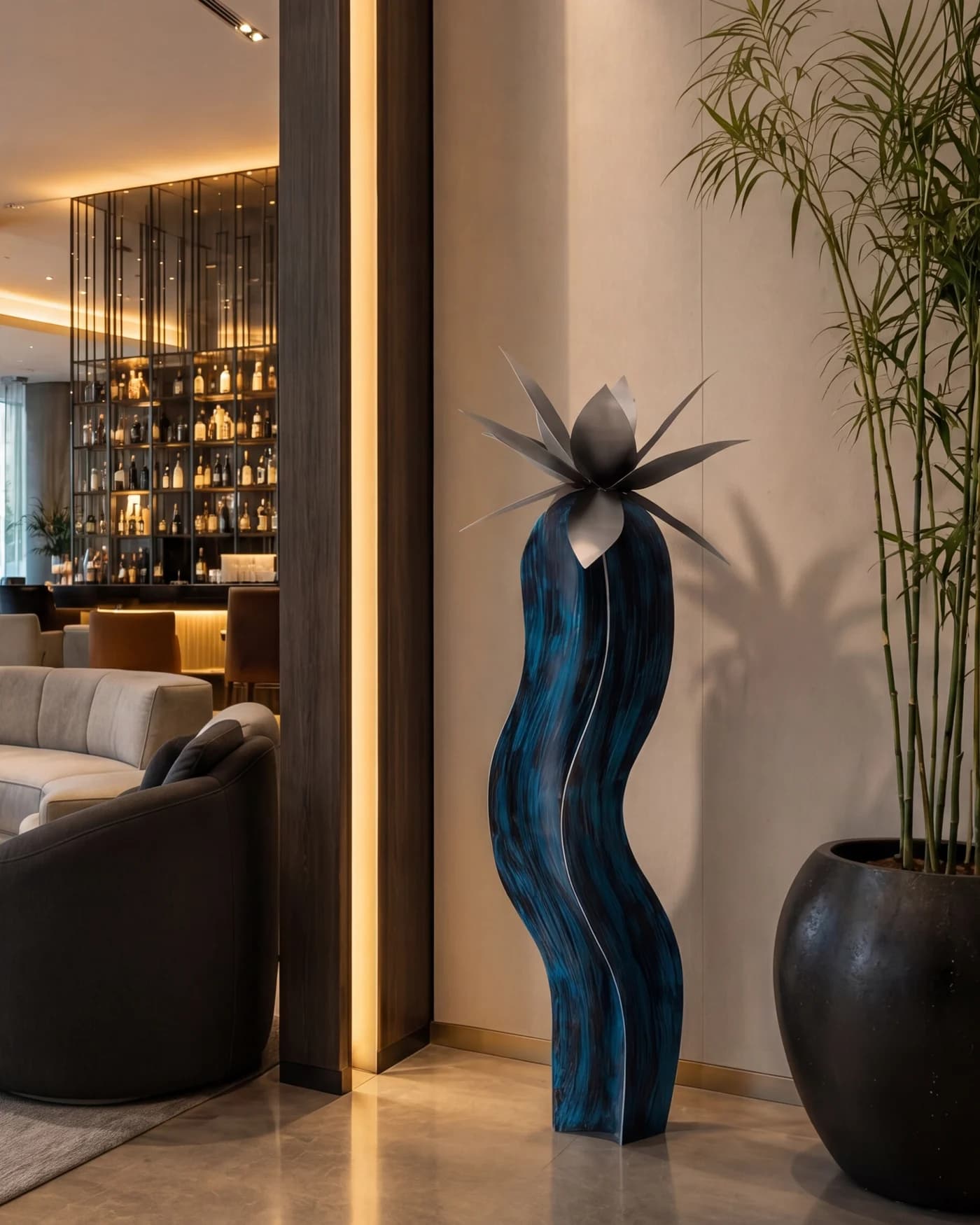 Blue steel Lily with a silver bloom in an architectural lounge setting