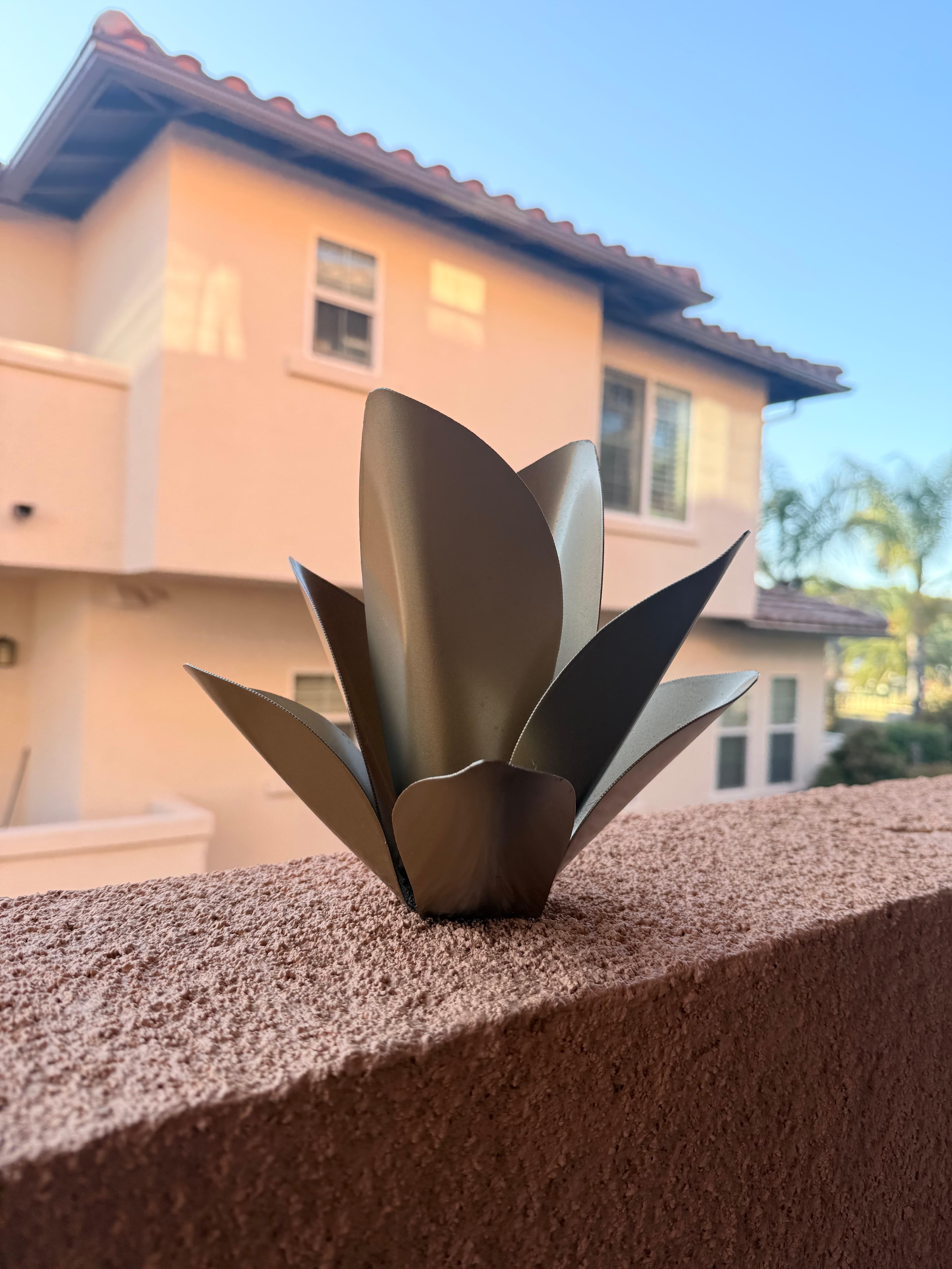 Close-up of a hand-finished Axel Decor steel sculpture
